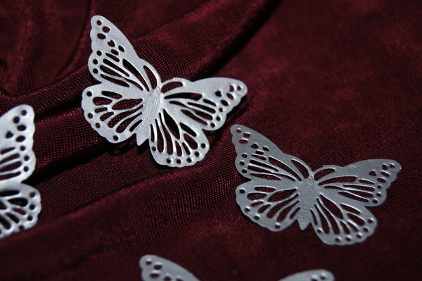Schmetterlinge aus Metall silber