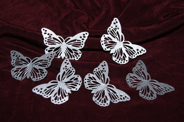 Schmetterlinge aus Metall silber